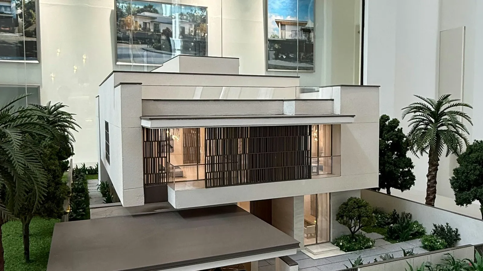 Scale model of a modern villa project in a developer showroom, a key moment in off-plan sales
