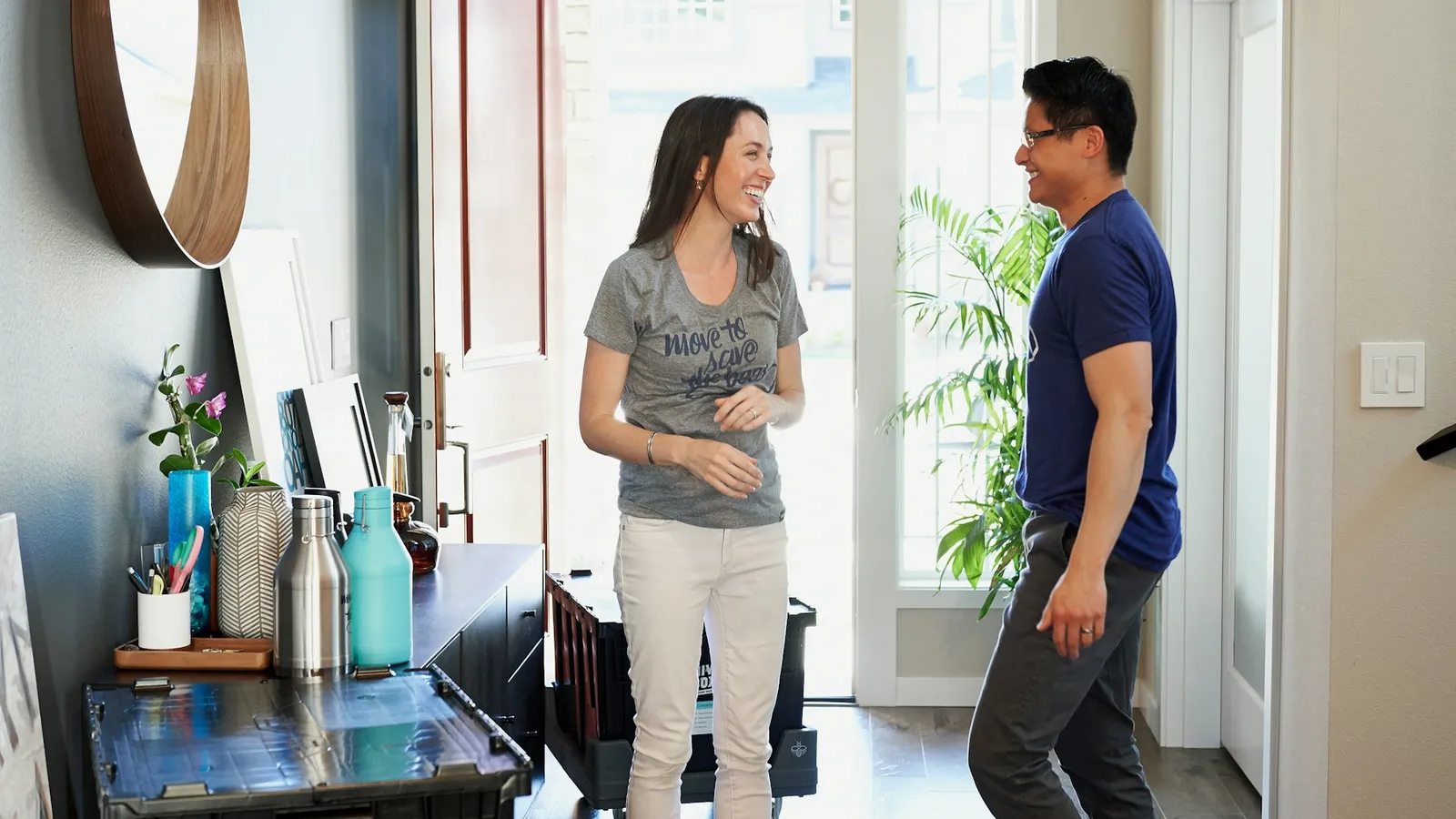 Couple meeting a real estate agent at a property after finding the agency through online lead generation